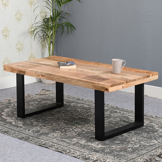 Read more about Salter solid mangowood coffee table in rough swan