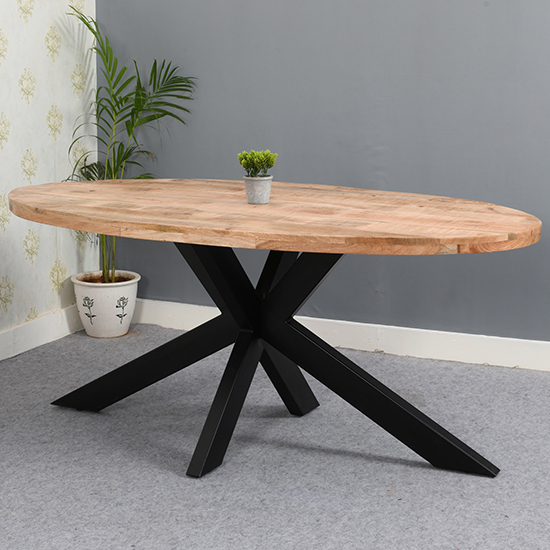 Read more about Salter solid mangowood oval dining table in rough sawn