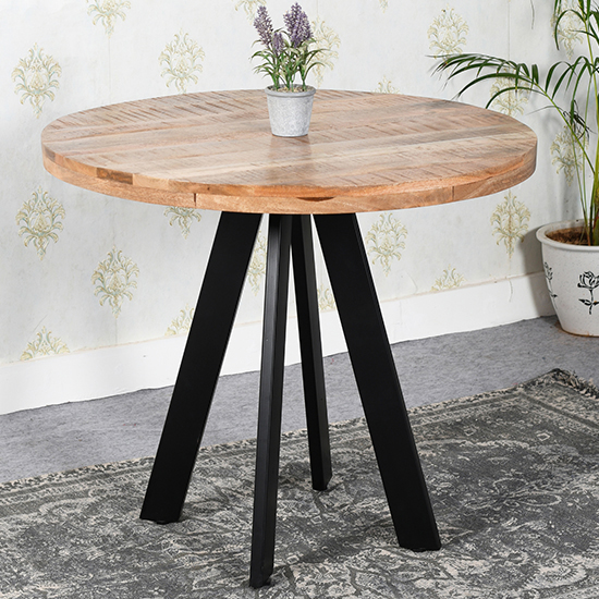 Read more about Salter solid mangowood round dining table in rough sawn