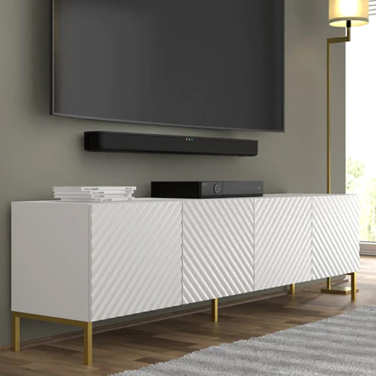 Read more about Sanford wooden tv stand with 4 doors in white