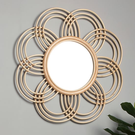 Photo of Santol sunflower wall mirror in natural rattan frame