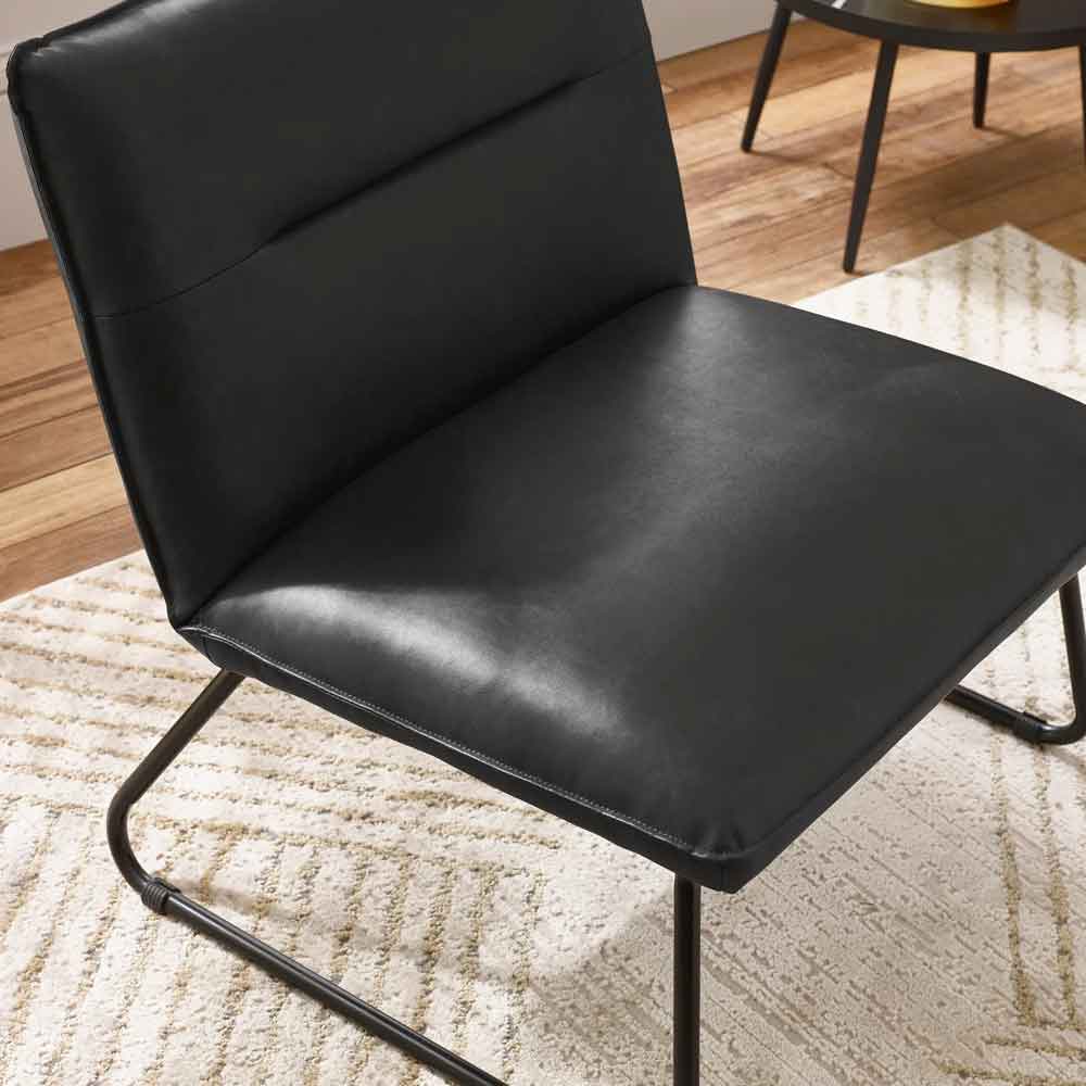Savelle Faux Leather Lounge Chair in Black