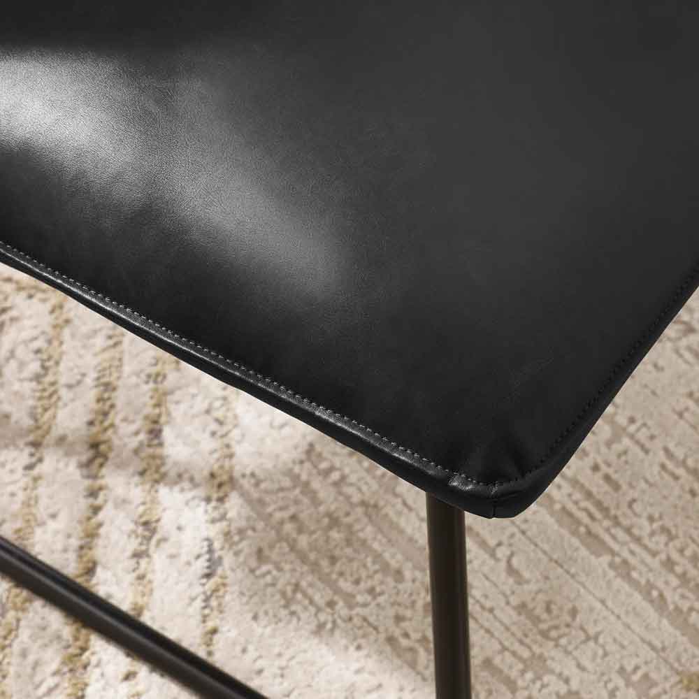 Savelle Faux Leather Lounge Chair in Black