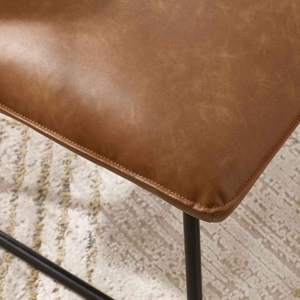 Savelle Faux Leather Lounge Chair in Brown