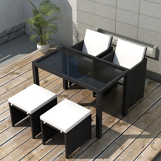 Photo of Savir rattan outdoor 4 seater dining set with cushion in black