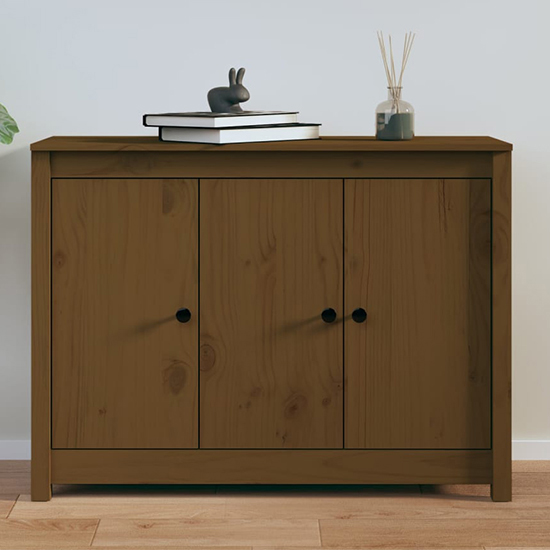 Photo of Secia pinewood sideboard with 3 doors in honey brown