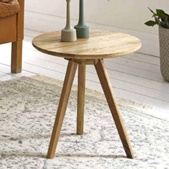 Photo of Selma round solid wooden side table in oak