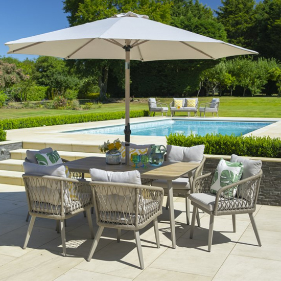 Photo of Seras rectangular 6 seater dining set with 3.0m parasol in sand