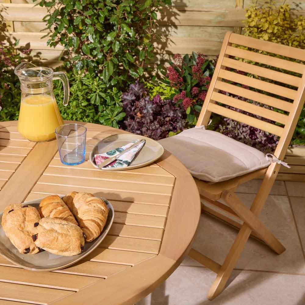Serenity Wooden Round Dining Table with 4 Chairs and Cushions in Natural