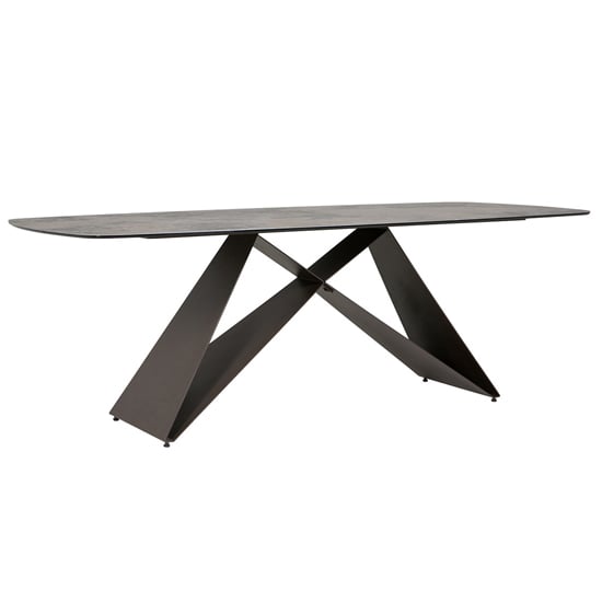 Photo of Seta large rectangular stone dining table with black metal base