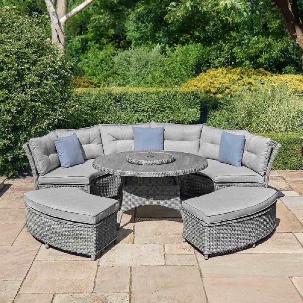 Sewanee Rattan Garden Curved Dining Set With Footstool In Stone