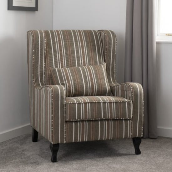 Photo of Shanaia stripe fabric fireside armchair in beige