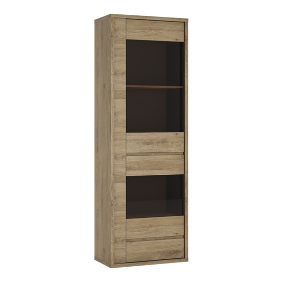 Photo of Sholka narrow wooden 1 door 1 drawer display cabinet in oak