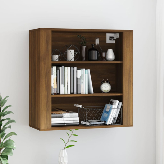 Photo of Silvis wooden wall shelving unit in brown oak