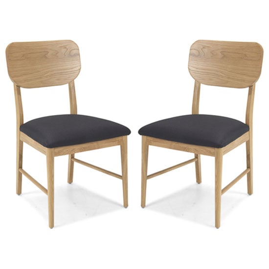 Photo of Skier black fabric dining chairs in a pair with wooden frame