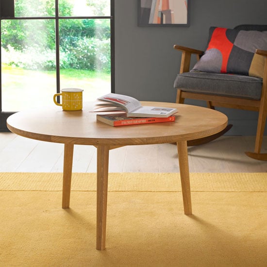 Photo of Skier wooden circular coffee table in light solid oak