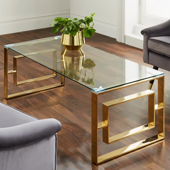 Photo of Solana clear glass coffee table with gold metal frame