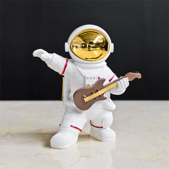 Product photograph of Spaceman Guitar Astronaut Figurine from Furniture in Fashion