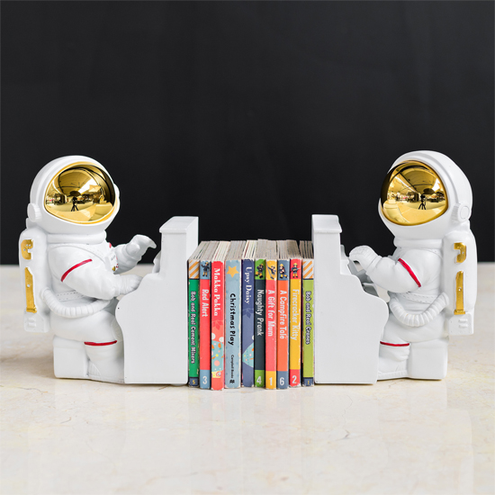 Product photograph of Spaceman Piano Playing Astronaut Book Ends Figurine In Pair from Furniture in Fashion