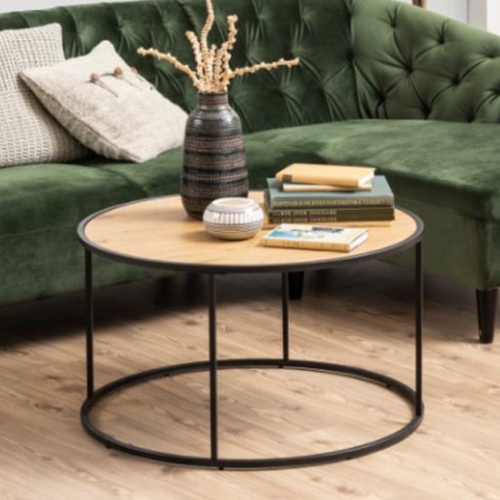 Read more about Sparks round wooden coffee table in matt wild oak