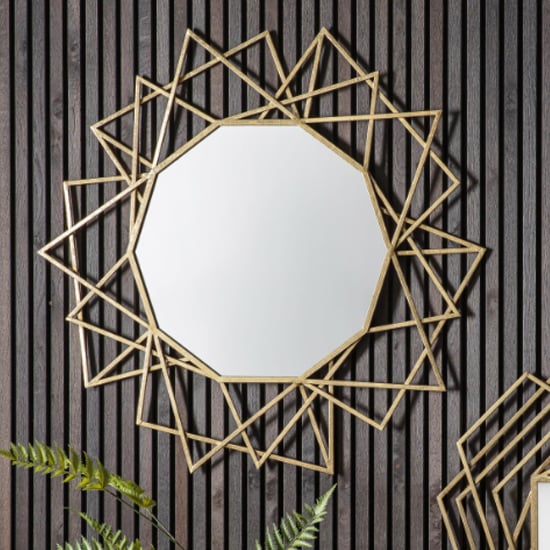 Read more about Spectra round wall mirror in gold frame