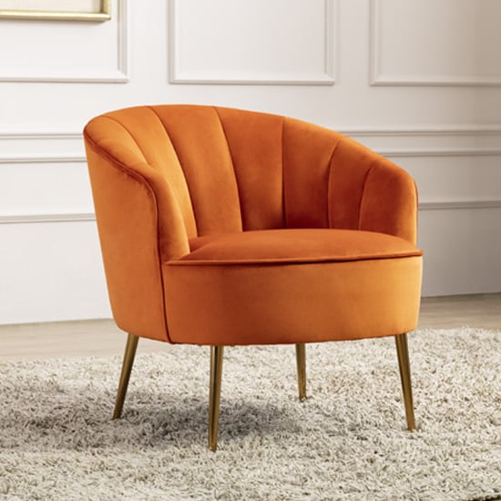 Photo of Stelloma velvet upholstered tub chair in pumpkin