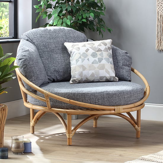 Product photograph of Surgut Rattan Snug Chair In Natural With Earth Grey Cushion from Furniture in Fashion