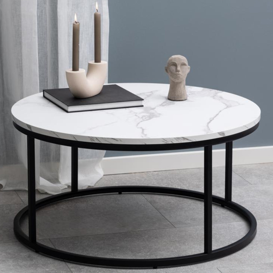Read more about Suva wooden coffee table round in white marble effect