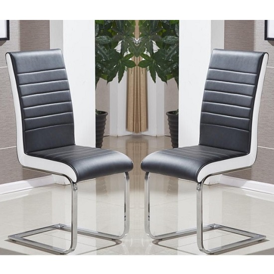 Read more about Symphony black and white faux leather dining chairs in pair