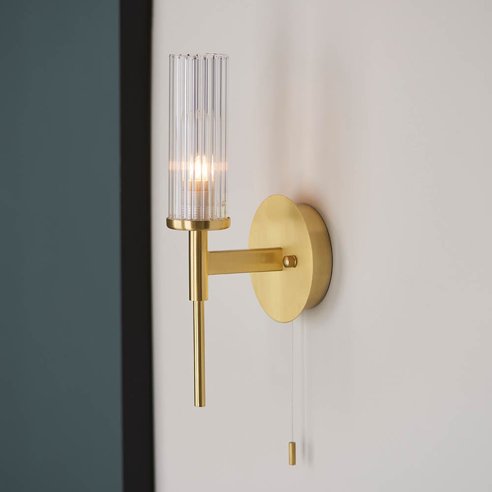 Read more about Talo clear ribbed glass shade bathroom wall light in brass