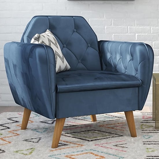 Photo of Taluka memory foam velvet armchair with wooden legs in blue