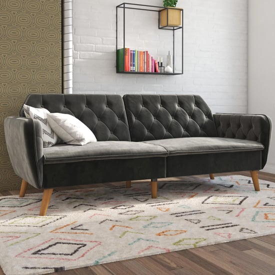 Read more about Taluka velvet sofa bed with wooden legs in grey