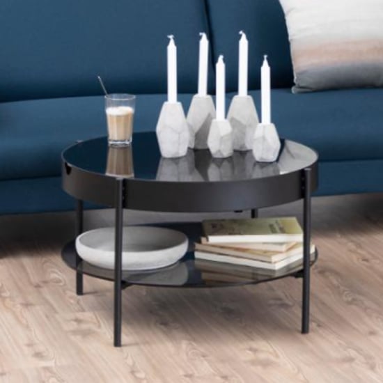 Read more about Tarrytown round smoked glass coffee table with undershelf