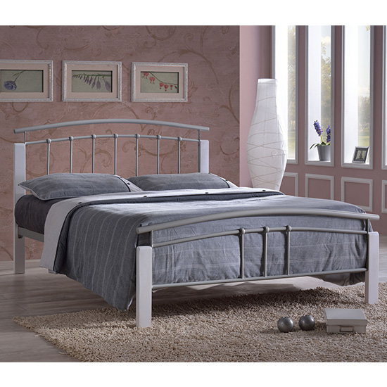 Photo of Tetron metal king size bed in silver with white wooden posts