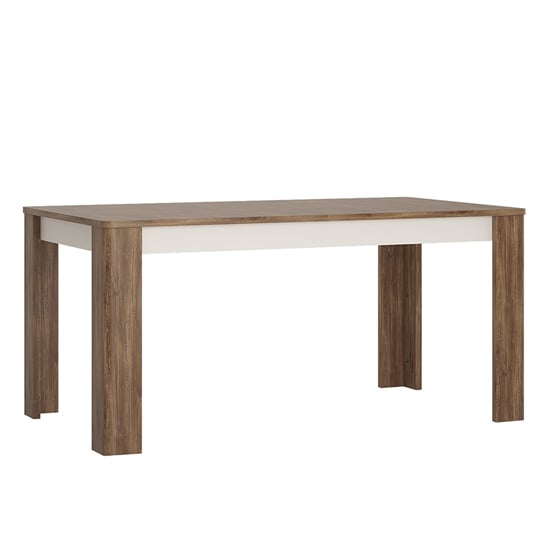 Photo of Toltec wooden extending dining table in oak and white gloss