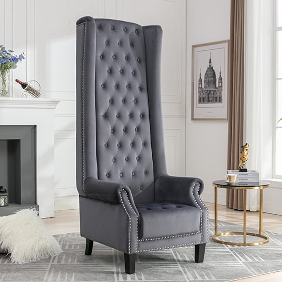 View Trento tall upholstered velvet porter chair in grey