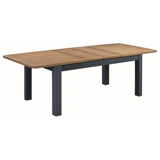 Photo of Trevino large extending dining table in midnight blue and oak