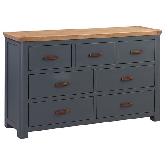 Read more about Trevino wooden chest of 7 drawers in midnight blue and oak