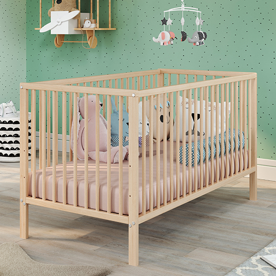 Read more about Uvatera wooden baby cot with slatted frame in beech