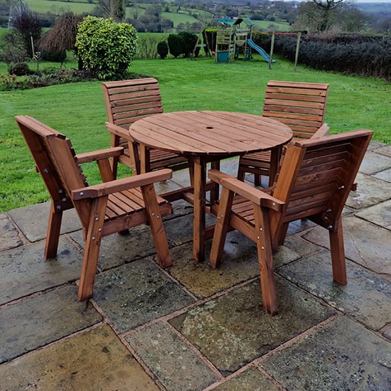 Photo of Vail timber brown dining table round with 4 chairs