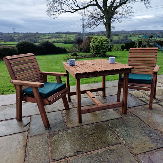 Read more about Vail timber brown dining table small with 2 chairs and cushion