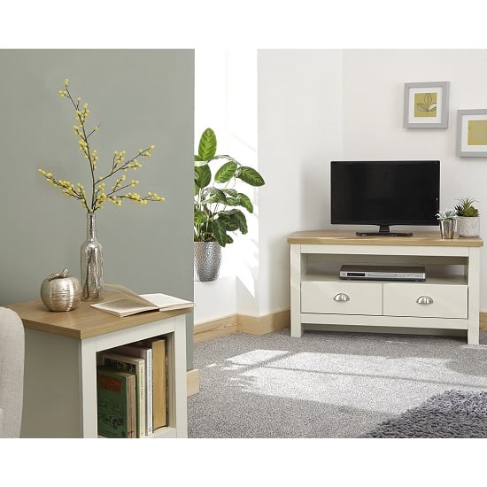 Photo of Loftus wooden corner tv stand in cream with 2 drawers