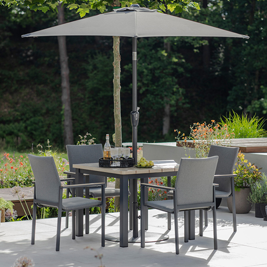 Product photograph of Vega 4 Seater Dining Set With Stacking Chairs And 2 5m Parasol from Furniture in Fashion
