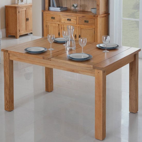 Product photograph of Velum Wooden Extending Dining Table In Chunky Solid Oak from Furniture in Fashion