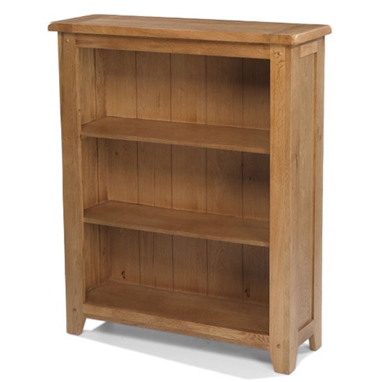 Read more about Velum wooden low bookcase in chunky solid oak