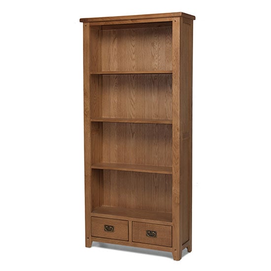 Photo of Velum wooden tall bookcase in chunky solid oak with 2 drawers