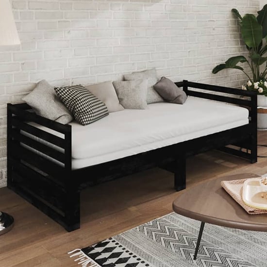Photo of Veras solid pinewood pull-out single day bed in black