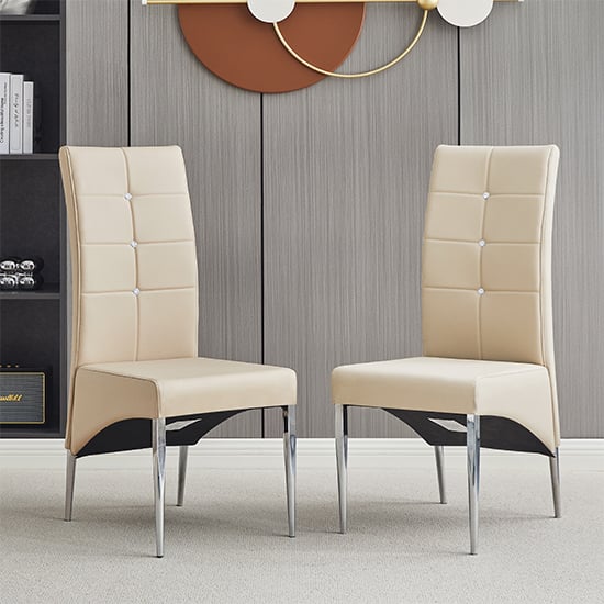 Photo of Vesta studded taupe faux leather dining chairs in pair