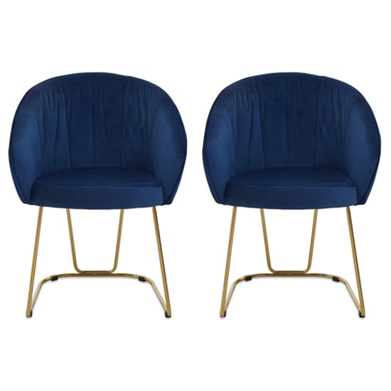 Photo of Vinita upholstered midnight blue velvet dining chairs in a pair
