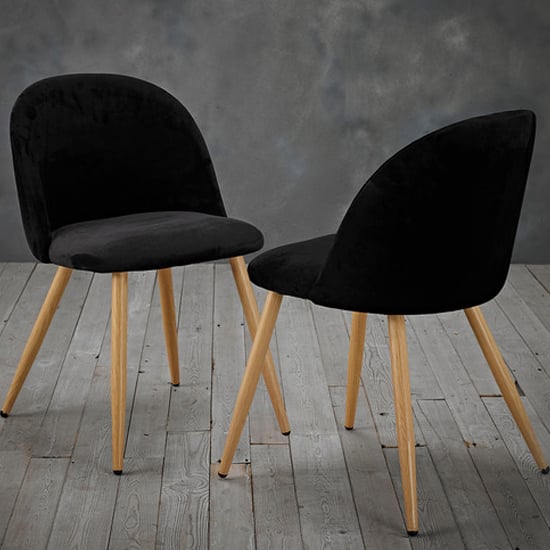 Photo of Vinos black velvet dining chairs with oak metal legs in pair